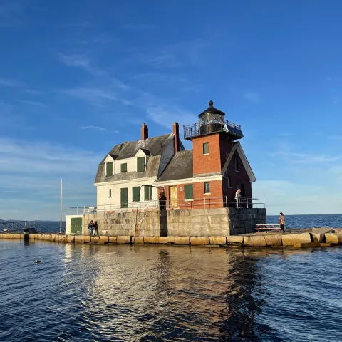 a castle surrounded by a body of water