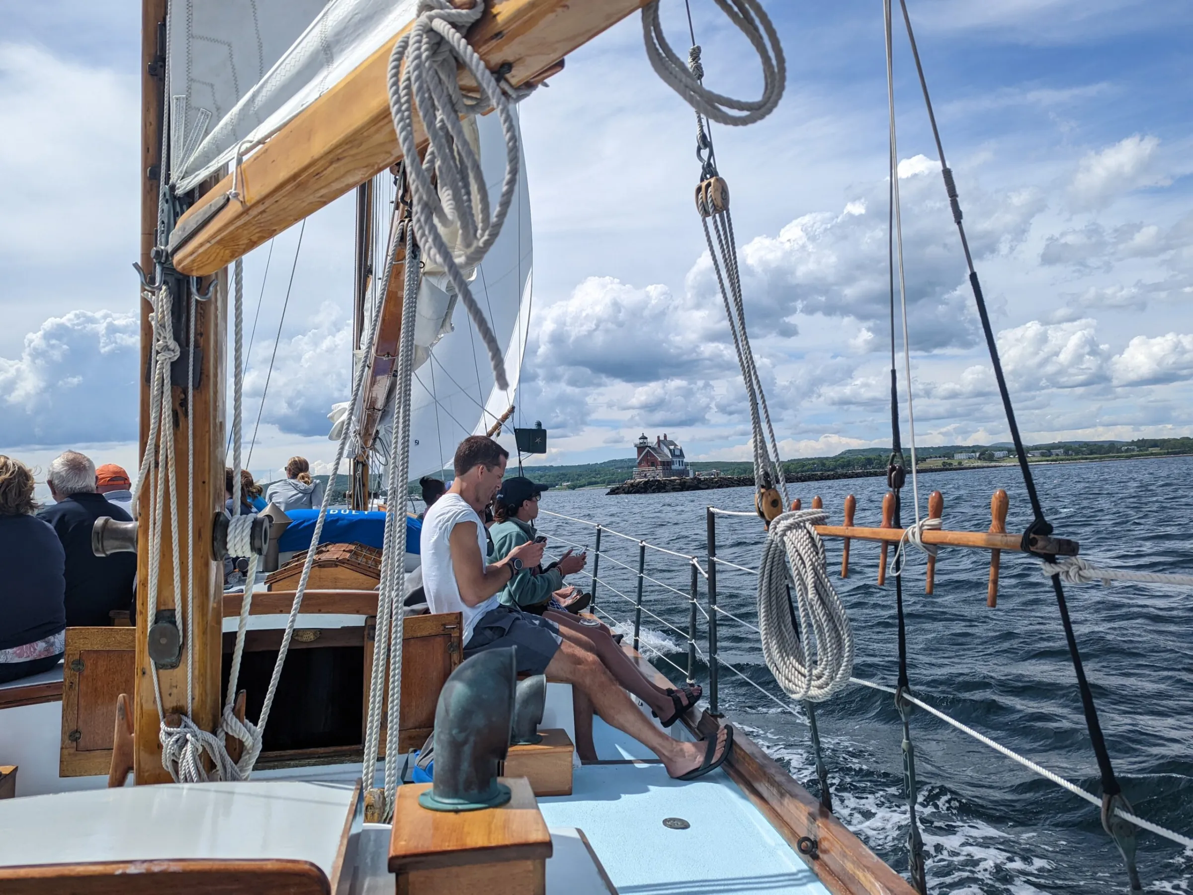 a group of people on a boat in the water