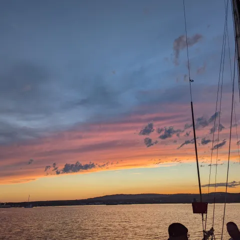 a sunset over a body of water