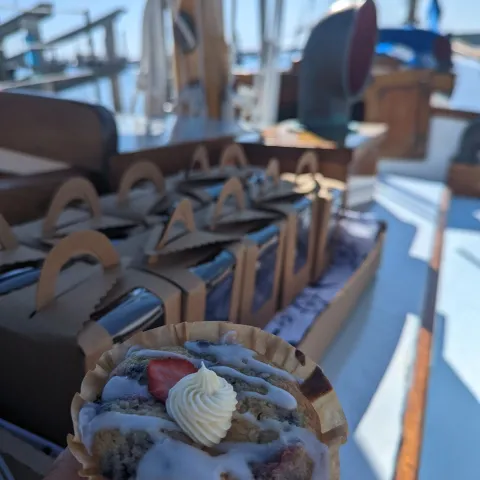 a table topped with a blue chair