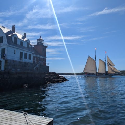a small boat in a large body of water