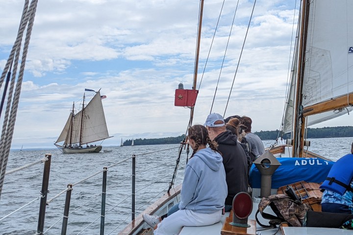 a woman standing on a boat